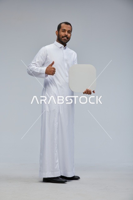 Saudi Man Holding Blank Sign with Thumbs Up