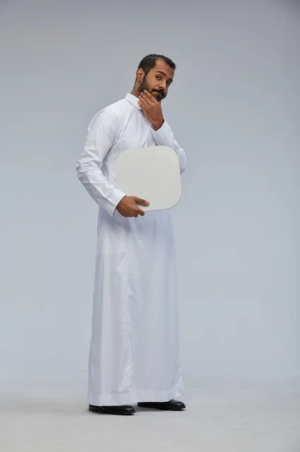 Saudi Man Holding Blank Rounded Edge Signboard in Studio