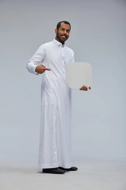 Saudi Man Holding and Pointing to Blank White Sign