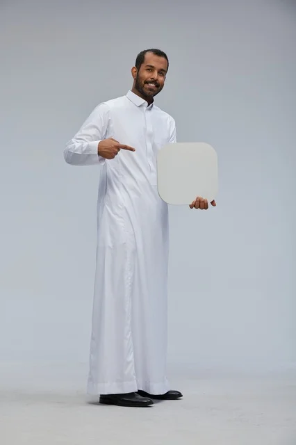 Saudi Man Holding Blank White Board in Studio