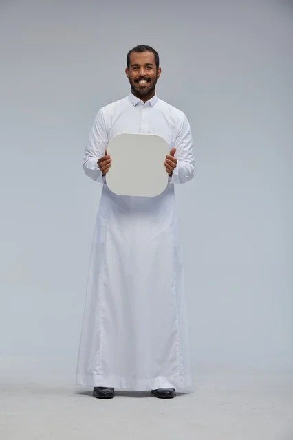 Saudi Man in Thobe Holding Blank White Rounded Sign