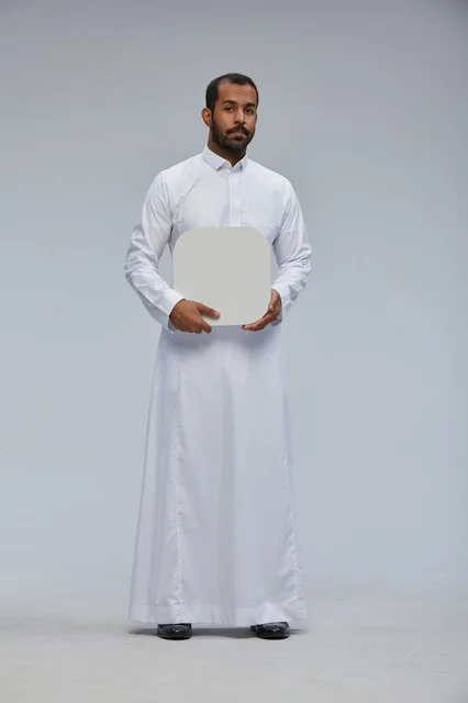 Saudi Arabian Man Holding Blank White Sign Board in Studio