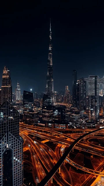Burj Khalifa Dubai Skyline and Highway at Night