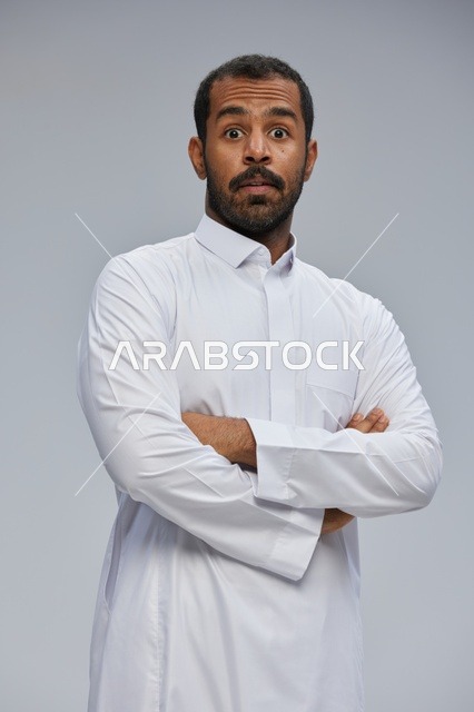 Surprised Saudi Man in White Thobe Studio Portrait
