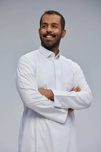 Saudi Man in Traditional White Thobe Studio Portrait
