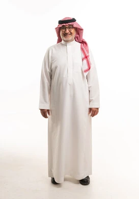 Middle-aged Saudi Man in Traditional Dress White Background