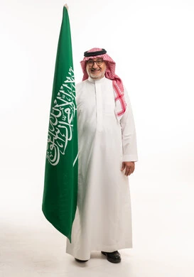 Saudi Man Holding Saudi Arabian National Flag