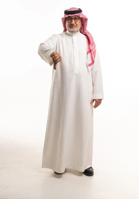 Saudi Man Thumbs Down Gesture in Traditional Dress