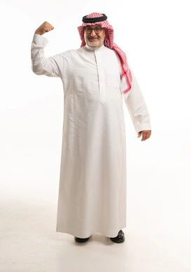 Saudi Man in Traditional Thobe Flexing Muscle Studio