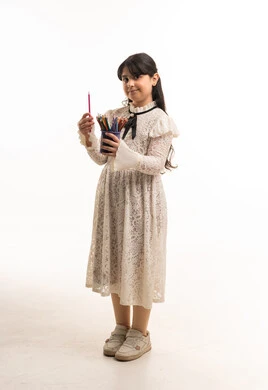Arab Girl in White Lace Dress Holding Colored Pencils