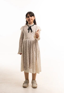 Arab Girl in Lace Dress Giving Thumbs Up