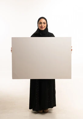 Saudi Woman Holding Blank White Board in Studio