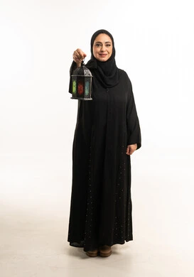 Emirati Woman Holding Traditional Ramadan Lantern