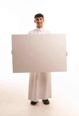 Saudi Man Holding Blank White Board in Studio
