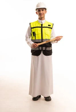 Saudi Engineer in Thobe and Safety Vest Holding Blueprint