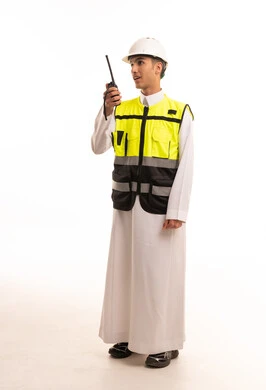 Saudi Engineer in Thobe and Safety Vest with Radio