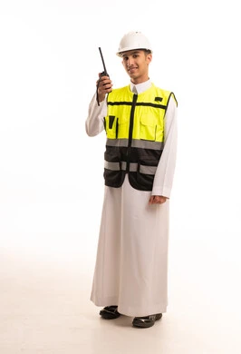 Saudi Engineer in Thobe and Safety Gear with Radio