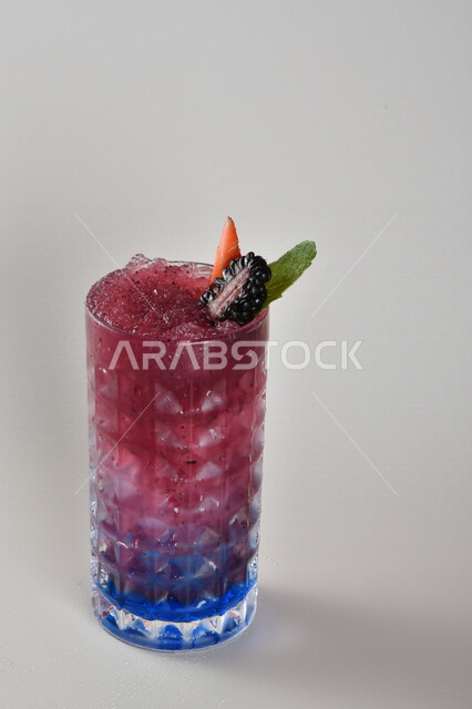 Close-up of mojito juice with fresh fruits, cranberry drink, cold drinks, delicious natural juices, healthy and useful juice, refreshing and iced summer cocktail