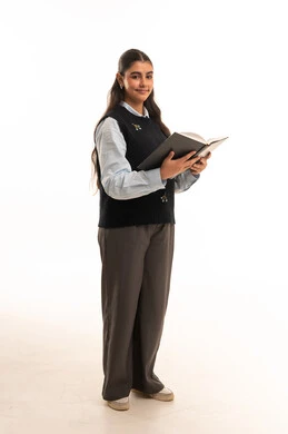Saudi Female Student Holding Book in Studio