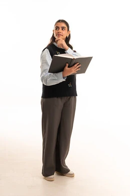 Arab Woman Holding Book Thinking in Studio Setting