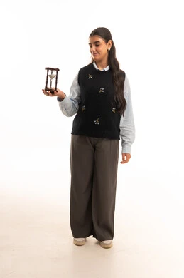 Saudi Arab Woman Holding Hourglass on White Background