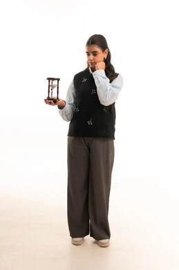 Saudi Woman with Hourglass on White Background