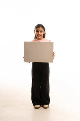 Young Saudi Girl Holding Blank Sign on White Background