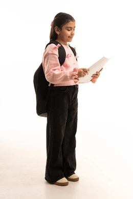 Saudi Girl Student Reading Paper on White Background
