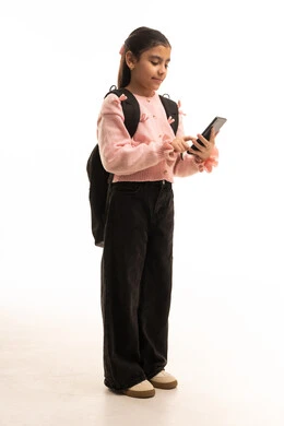 Arab Girl with Backpack Using Smartphone White Background