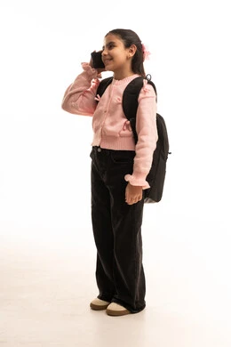 Saudi Girl with Backpack Talking on Smartphone