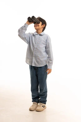 Young Arab Boy Looking Through Binoculars on White