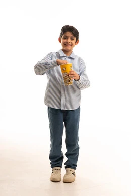 Saudi Boy Eating Popcorn on White Background