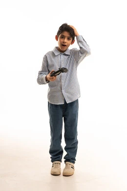 Arab Boy with Gaming Controller and Shocked Expression