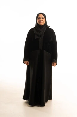 Saudi Woman in Black Abaya on White Background