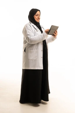 Arab Female Doctor Using Tablet on White Background