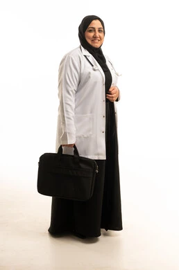 Arab Female Doctor in White Lab Coat Holding Briefcase