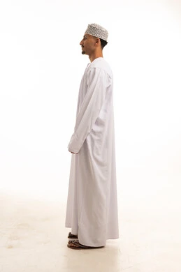 Omani Man in Traditional White Dishdasha Profile