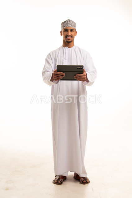Omani Man with Digital Tablet on White Background