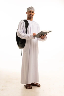 Omani Student in Traditional Dress with Backpack