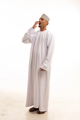 Omani Man in Traditional Dress Yawning on White Background