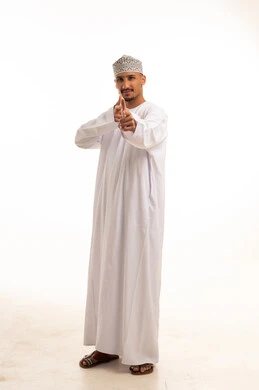 Omani Man in Traditional Dishdasha and Kumma Studio Shot