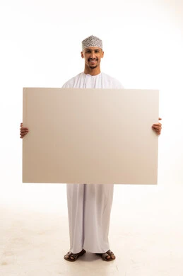 Omani Man Holding Blank White Poster on White Background