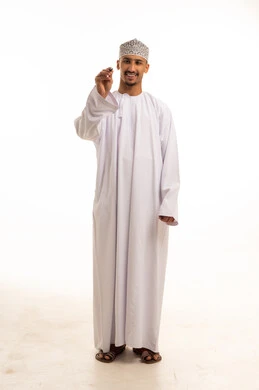 Omani Man in Traditional Dress Writing with Marker