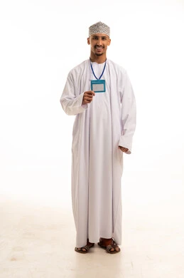 Omani Man in Traditional Dishdasha Holding ID Badge