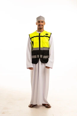 Omani Man in Traditional Dress and Safety Vest