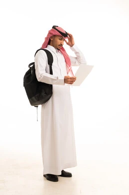 Saudi Man in Traditional Thobe Holding Paper with Backpack