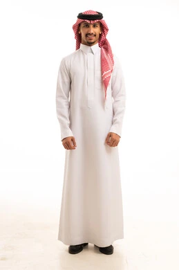 Saudi Man in Traditional White Thobe and Shemagh