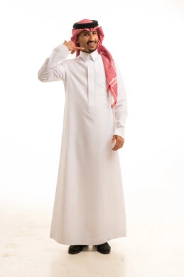 Saudi Man in Traditional Dress Making Call Gesture
