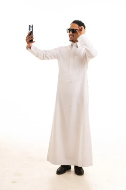 Saudi Man in White Thobe Taking Selfie Saudi Man in White Thobe Taking Selfie