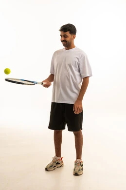 Saudi Man with Tennis Racket on White Background